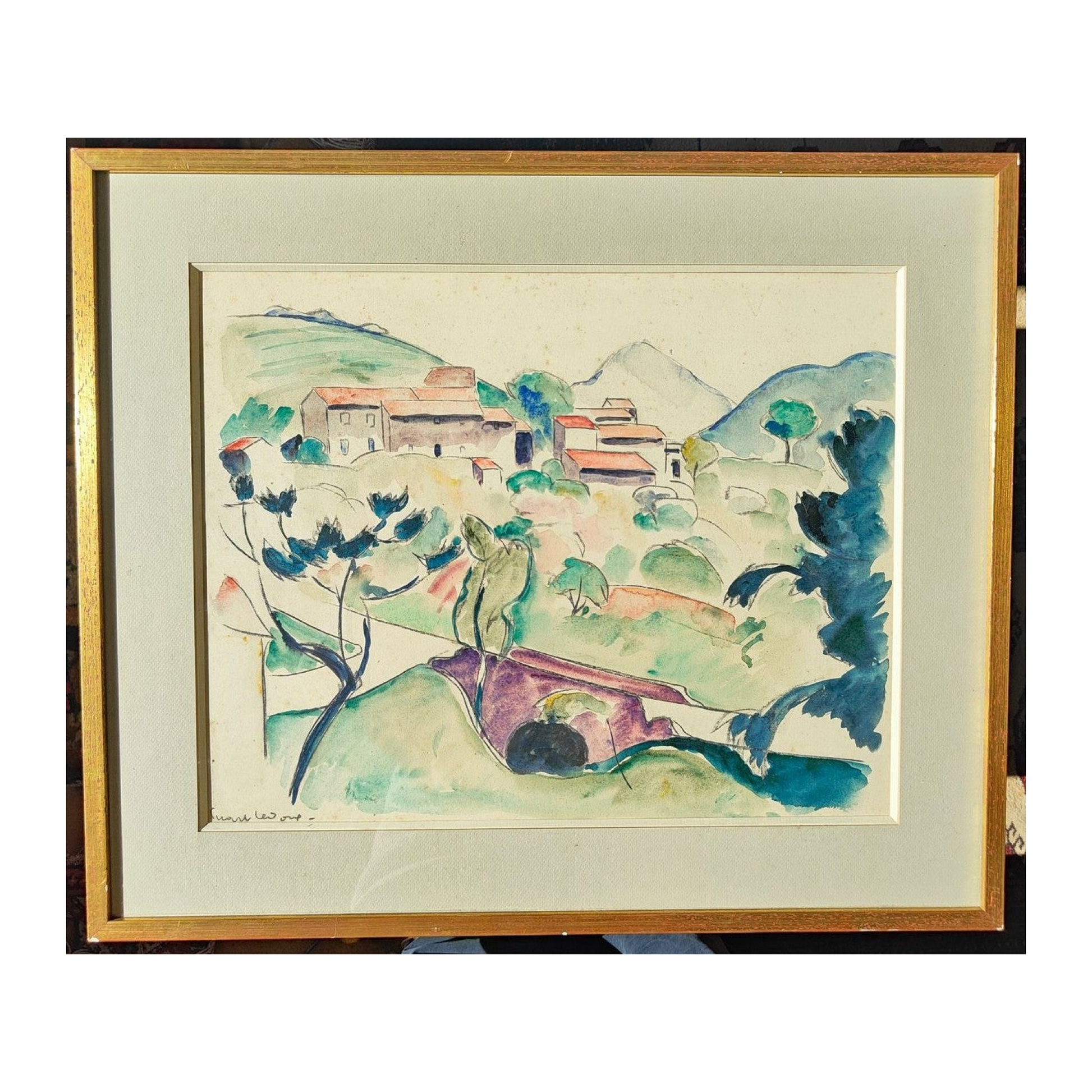 Aquarelle signée de Charles Picart Ledoux intitulée Le Village, représentant un paysage de village, présentée dans un encadrement élégant